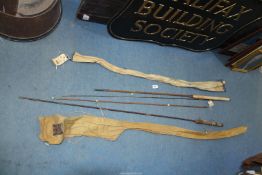 A Hardy fishing rod bag with Hardy spanner, together with two fishing rods; one marked 'Sturdy'.
