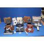 A quantity of vintage cameras to include; Kodak 620 Brownie,