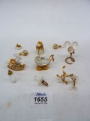 A small quantity of Swarovski crystal childhood ornaments including; pram, rocking horse, tricycle,