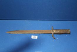 A WWI German Ersatz bayonet knife, model no: 2245, dated 1916, rust worn condition, 17" long.