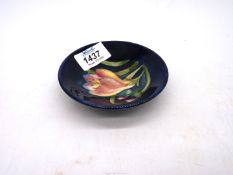 A small Moorcroft posy dish with crocus design.