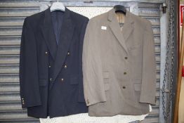 A Scott & Taylor gents navy blue, double breasted suit Jacket and a Jaeger gents pale brown,