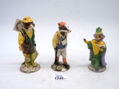 Two Beswick figures 'Fisherman Otter' and 'Hiker Badger' and Royal Doulton 'Mystic Bunnykins'.