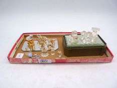 A small quantity of Swarovski crystal ornaments including; pram, rocking horse, present, train,