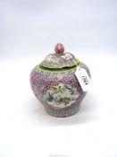 A Chinese Famille rose porcelain jar and cover, signed with reign mark, chipped rims.