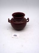 A Clement Massier, Vallauris pottery two handled Censer with ox blood glaze,