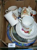 A quantity of china to include; wall plates, fruit plates, Coronation mugs, German egg cups, etc.
