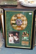 A 'Pirates of the Caribbean' gold disc framed with three stars signatures.