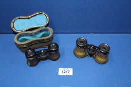 Two pairs of field/opera glasses, one pair cased.