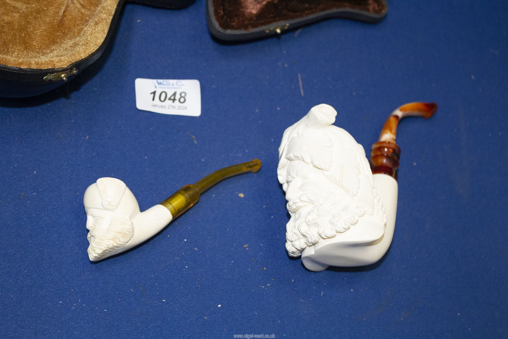 Two cased unsmoked meerschaum Pipes, the larger one carved as Dionysus, God of Wine, - Image 2 of 2