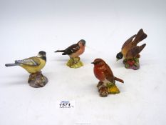 Four bird ornaments to include; two Beswick and two Royal Worcester including;