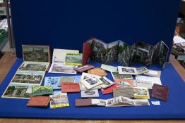 A box of tourist photo-books including Keswick, Innsbruck, Cote d'Azur, etc.