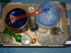 A quantity of coloured and clear glass including trifle bowls, nibbles dishes, bud vases etc.
