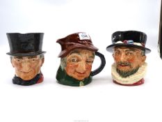 Three Royal Doulton character jugs 'Beefeater', 'Uncle Tom Cobley' and 'John Peel'.