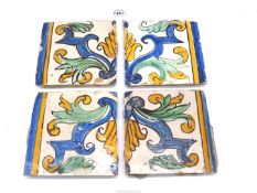 Four polychrome Spanish tiles together forming a geometric pattern, 17th or 18th century,