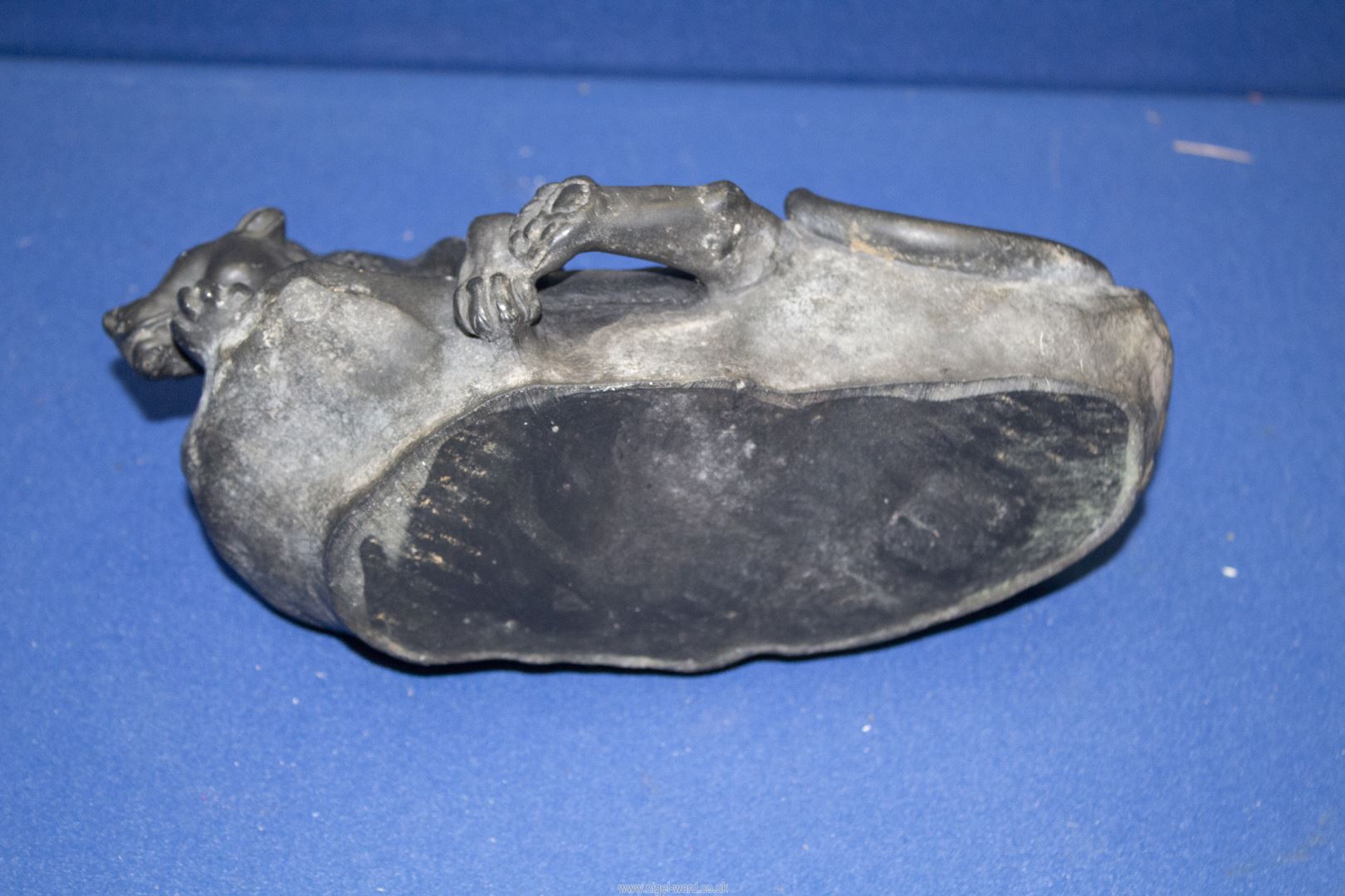 A black marble sculpture of a Puma lying on a rock, signed Masson, 9" long. - Image 4 of 4