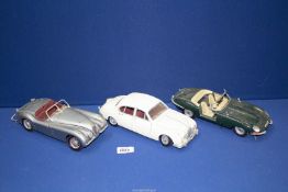 Three 1/18 scale model Jaguar cars including Maisto 1959 Mk II,