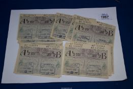 Twenty-eight consecutive Petrol coupons issued by the Ministry of Fuel and Power in 1950.