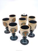 Eight Laugharne Pottery wine goblets.