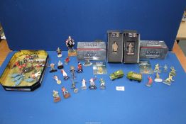 A box of model figures including Britains, Del Prado, some lead, plastic,