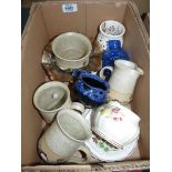 A small quantity of pottery to include two mugs, milk jug, sugar bowl,