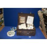 A vintage travel case and contents of ephemera including Baby book for Tessa Ruthven,