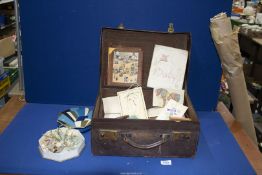 A vintage travel case and contents of ephemera including Baby book for Tessa Ruthven,