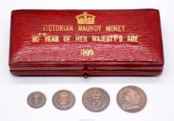 A cased set of four Victorian Maundy money 1899 in commemoration of Queen Victoria's 80th birthday.