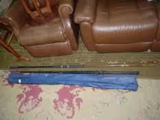 An Abu Atlantic 154 rod and another unnamed rod, with blue cover.