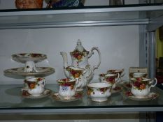 A Royal Albert 'Old Country Roses' coffee service plus two small cake stands.