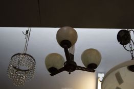 A 1930's three branch light fitting with marble effect shades.