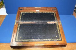 A Mahogany Writing box with tooled leather inset slope, some damage, 20" x 10" x 7 1/4".