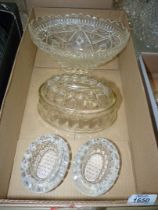 An oval pressed glass bowl, two glass salt cellars and glass jelly mould.