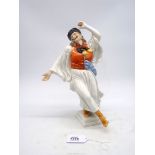 A Herend handpainted figure of a hatted male dancer in traditional costume, 12'' tall.