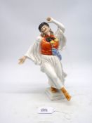 A Herend handpainted figure of a hatted male dancer in traditional costume, 12'' tall.