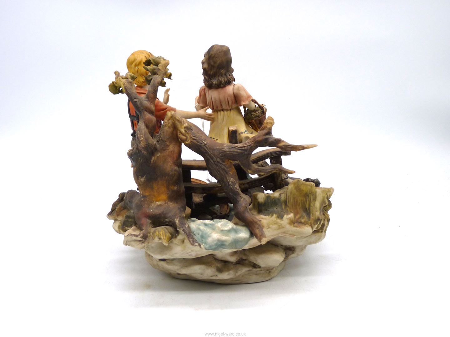 A Capo di Monte ornament of a girl and a boy on a bridge with a dog at their feet, - Image 2 of 2