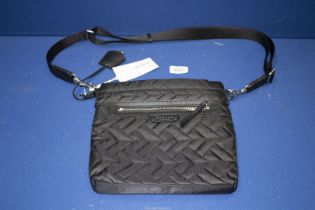 A Radley black quilted shoulder Bag, as new, still with original price tag.