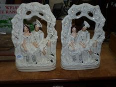 A pair of Staffordshire flatbacks of lovers under an arch,