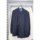 A black pinstripe double breasted suit by Austin Reed, 100% wool, jacket 48" short,