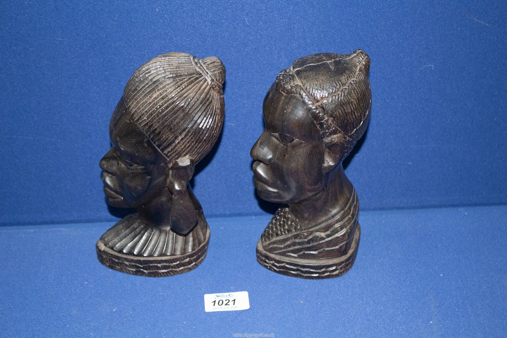 Two carved African heads of a lady and a man, 8'' tall. - Image 2 of 2