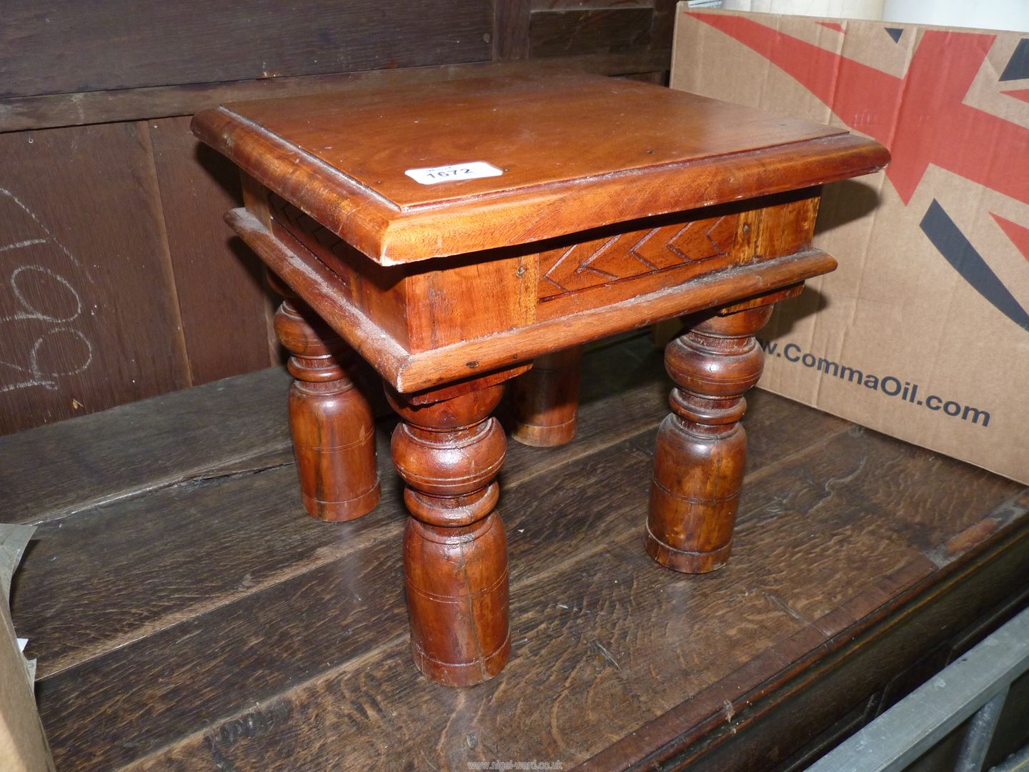 An Eastern hardwood occasional Table on turned legs, 11 7/8'' square x 11 5/8'' high.