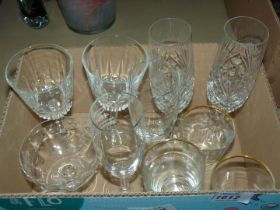 A box of glasses including champagne flutes (two inscribed with "Happy 40th Anniversary"),