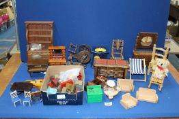 A quantity of dolls furniture including; musical Grand Piano, spinning wheels, chairs, dressers,