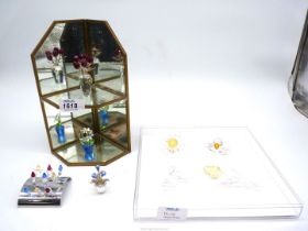 A small quantity of Swarovski crystal flowers including; tulips, sunflower, daisy, etc.