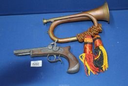 A replica Derringer pistol (a/f) and a brass and copper hunting horn.