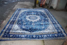 A Luxbury Collection border pattern carpet in dark blue and cream, 7'10'' x 10'6''.