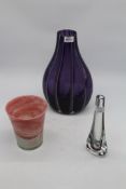 Three pieces of Studio Glass including large mauve striped vase, pink swirl vase and bud vase.
