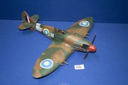 A tin plate model of a Spitfire, a/f.