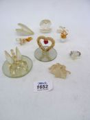 A small quantity if Crystal ornaments including; oysters, swans, Swarovski flowers, etc.