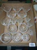 A quantity of matching Tudor cut glasses including six each martini and sherry and four brandy.